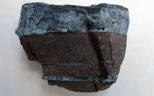 Crocidolite (blue) asbestos in its natural rock form